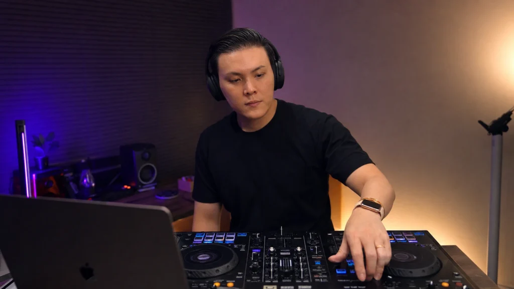 Beginner DJ practicing and learning from common mistakes on a controller