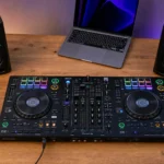 Complete beginner DJ gear collection arranged on a desk