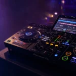 Complete beginner DJ gear collection arranged on a desk